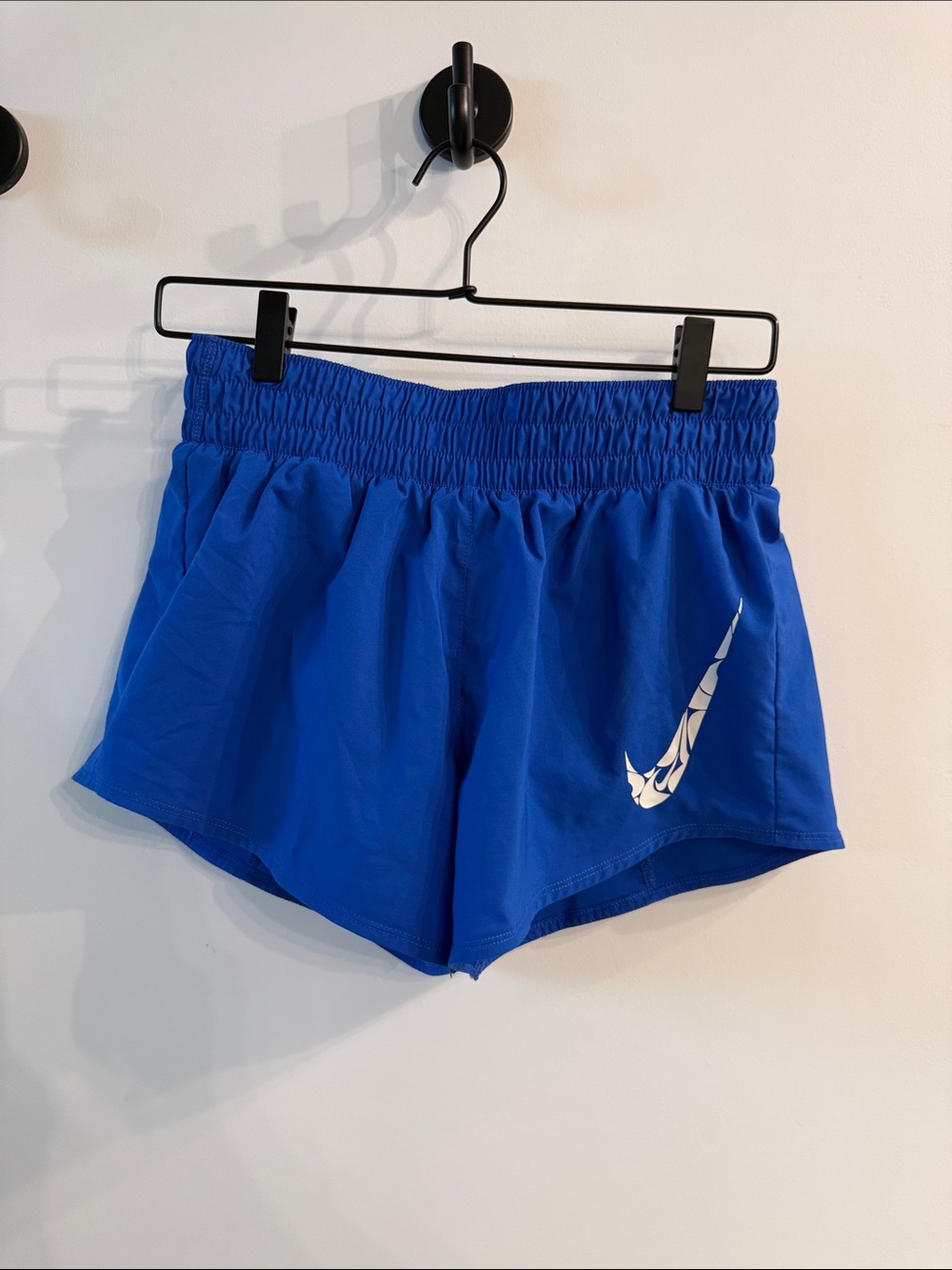 Nike Women’s Blue Athletic Running Shorts with White Swoosh